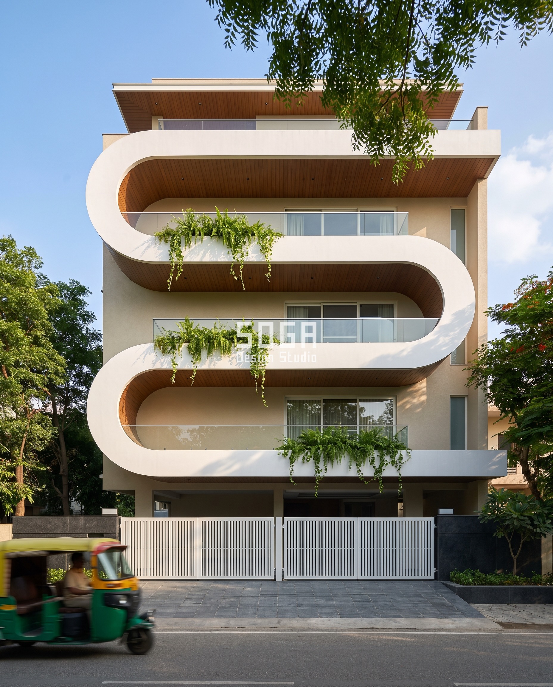 Glass Balcony Railing Fogging: It's The Seal, Not The Glass 3 A continuous white GFRC serpentine band wrapping a South Delhi corner residence into deep balcony pockets, the glass balcony railing's base and drainage edge held fully visible beneath each curve.