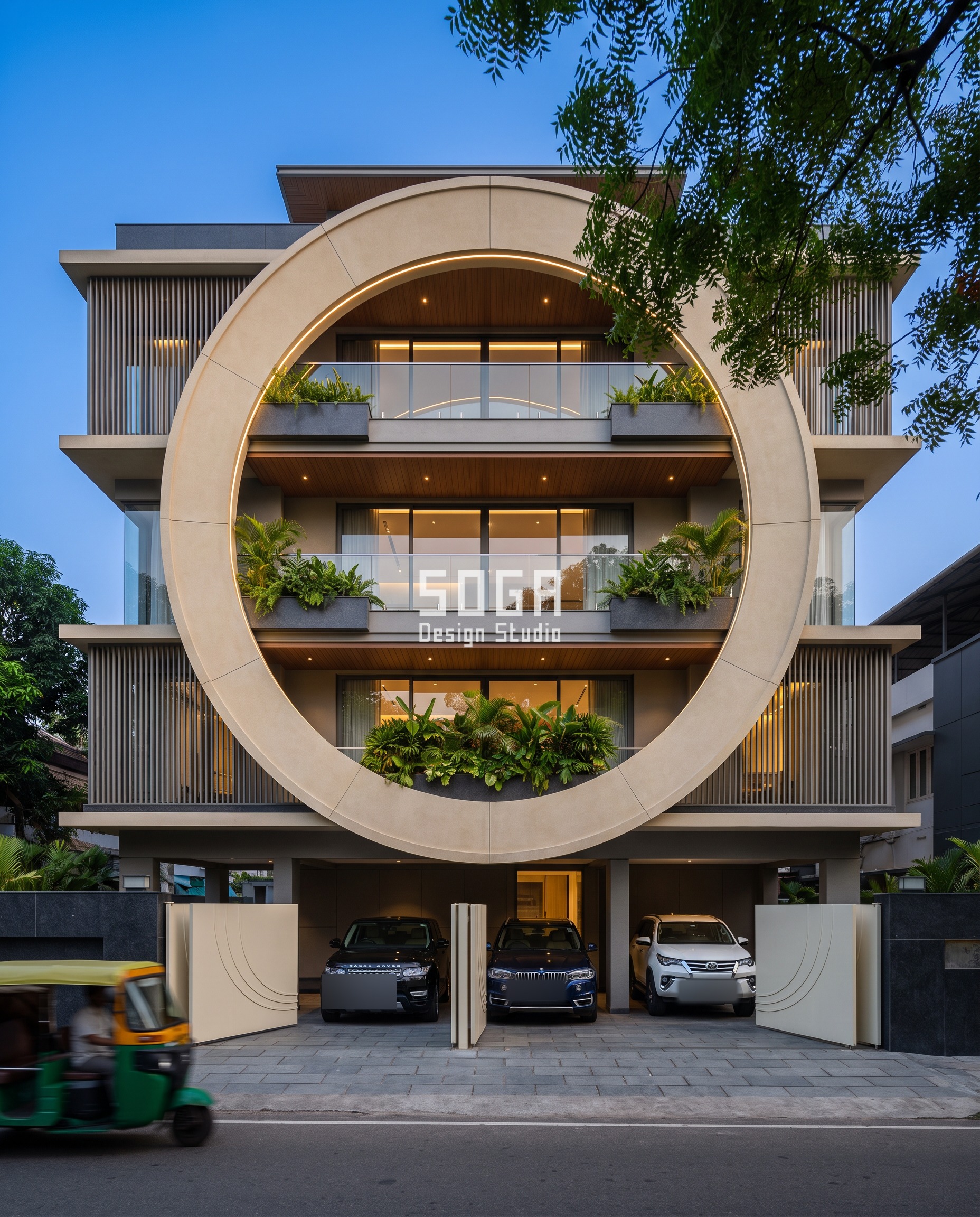 Continuous Facade Gesture: One Move Across Every Floor 1 One continuous facade gesture across floors in India - a 13 m cream GFRC ring cuts through three balcony floors on this Kochi residence, open inside the ring and screened outside it.
