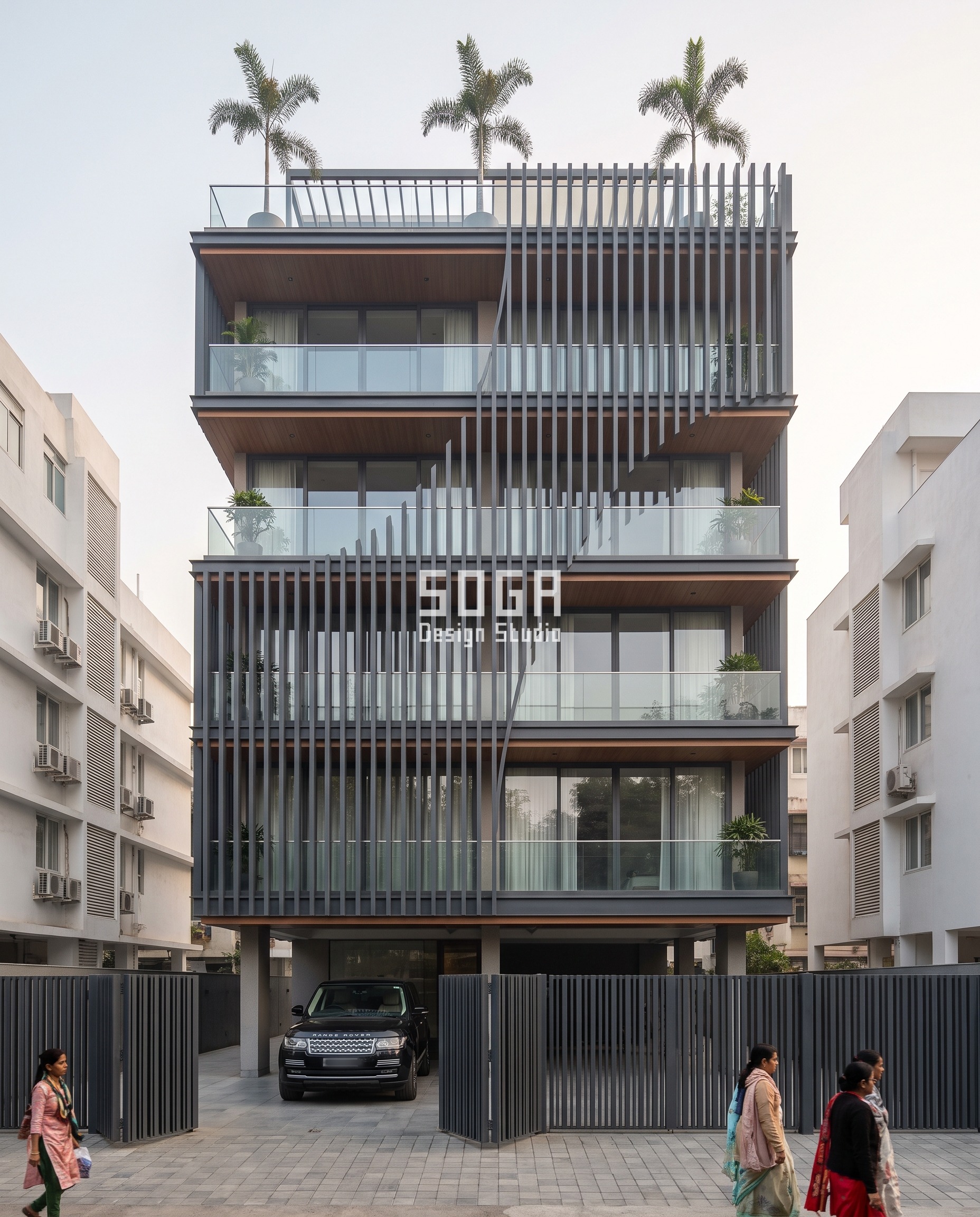 Parametric facade design in Mumbai (Bandra): matte charcoal-anthracite aluminium fins on this G+4 builder-floor residence twist gradually along their height, from 0 degrees at the base to a full 90 degrees at the top, the twist increasing fin by fin so the screen reads as a flowing wave.